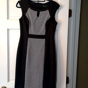 Sleeveless black and white sheath dress